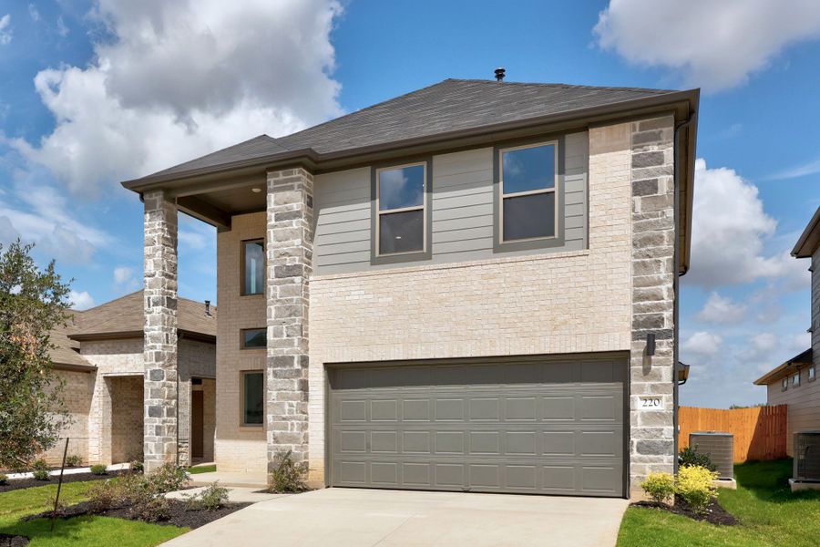 Front exterior of a new home in Trinity Ranch, Elgin, TX, highlighting curb appeal (Image 22).