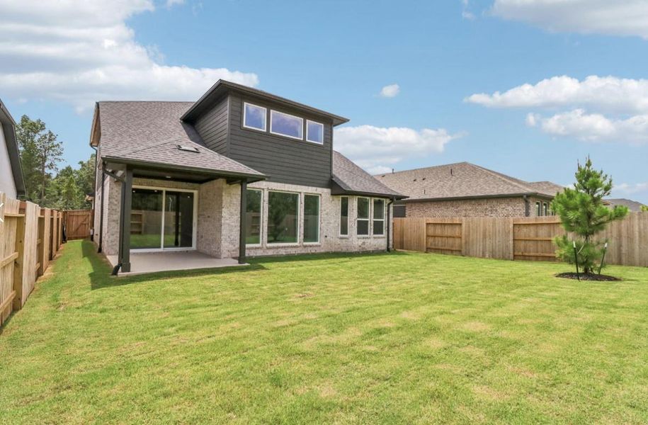 Exterior details and patio area of a home in WILDTREE 50', Montgomery (Image 3).