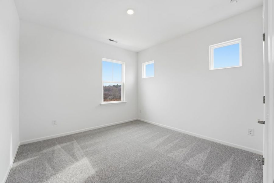 Spacious, unfurnished interior of a new home in Ridge at Sugar Creek, Indian Land (Image 11).