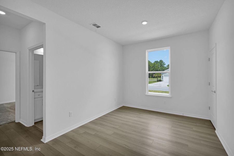 Spacious, unfurnished interior of a new home in Summer Bay at Grand Oaks, St. Augustine (Image 12).