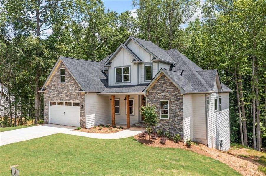 Front exterior of a new home in , Canton, GA, highlighting curb appeal (Image 23).