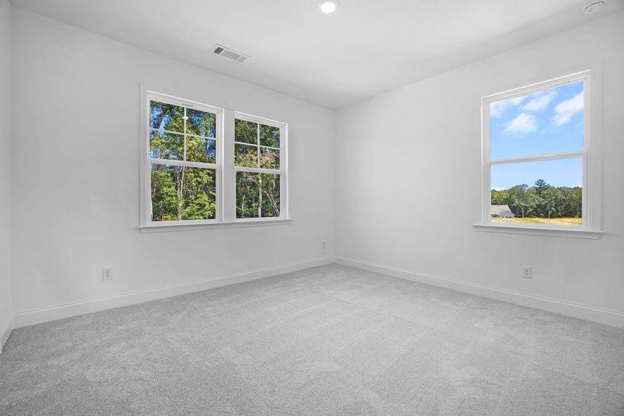 Spacious, unfurnished interior of a new home in Bailey Fence, Dacula (Image 24).