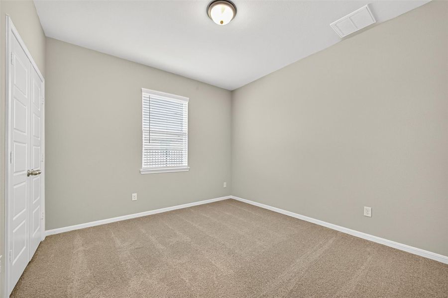 Spacious, unfurnished interior of a new home in Sunterra, Katy (Image 33).