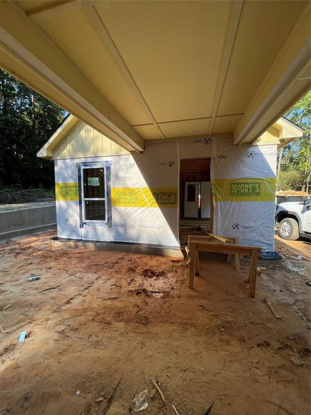 Covered Breezeway to the Garage from the Laundry Room Covered Breezeway to the Garage from the Laundry Room