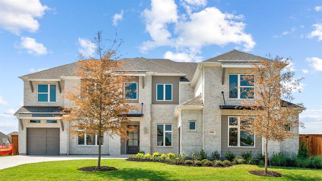 Front exterior of a new home in Terraces 82'/100', Rockwall, TX, highlighting curb appeal (Image 1). Front exterior of a new home in Terraces 82'/100', Rockwall, TX, highlighting curb appeal (Image 1).