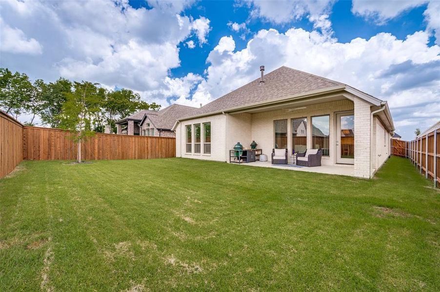 Exterior details and patio area of a home in Trinity Falls, McKinney (Image 4).