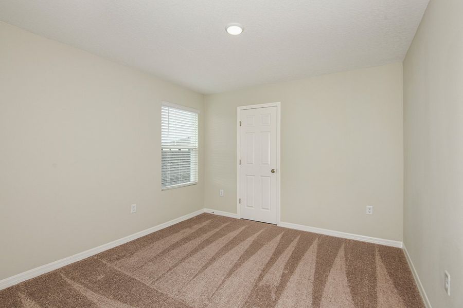 Spacious, unfurnished interior of a new home in Scenic Terrace, Haines City (Image 19).