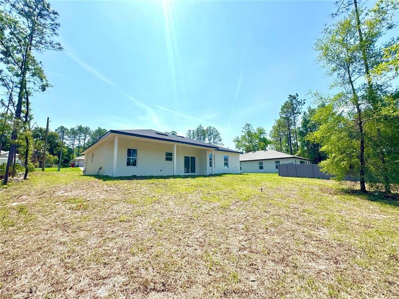 Exterior details and patio area of a home in , Citrus Springs (Image 4).