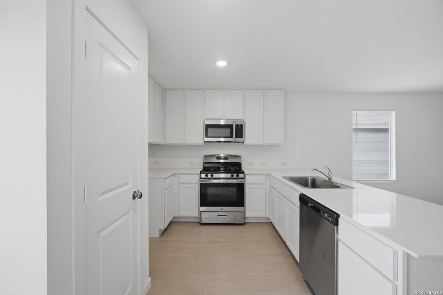 Furnished interior view inside a new home in Rose Valley, Converse (Image 11).