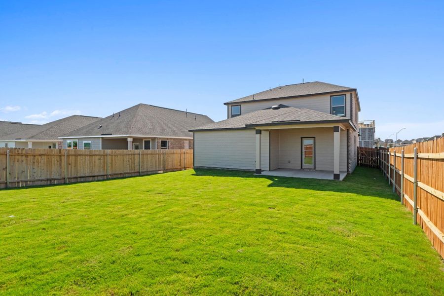 Front exterior of a new home in Salerno - Heritage Collection, Round Rock, TX, highlighting curb appeal (Image 2). Front exterior of a new home in Salerno - Heritage Collection, Round Rock, TX, highlighting curb appeal (Image 2).
