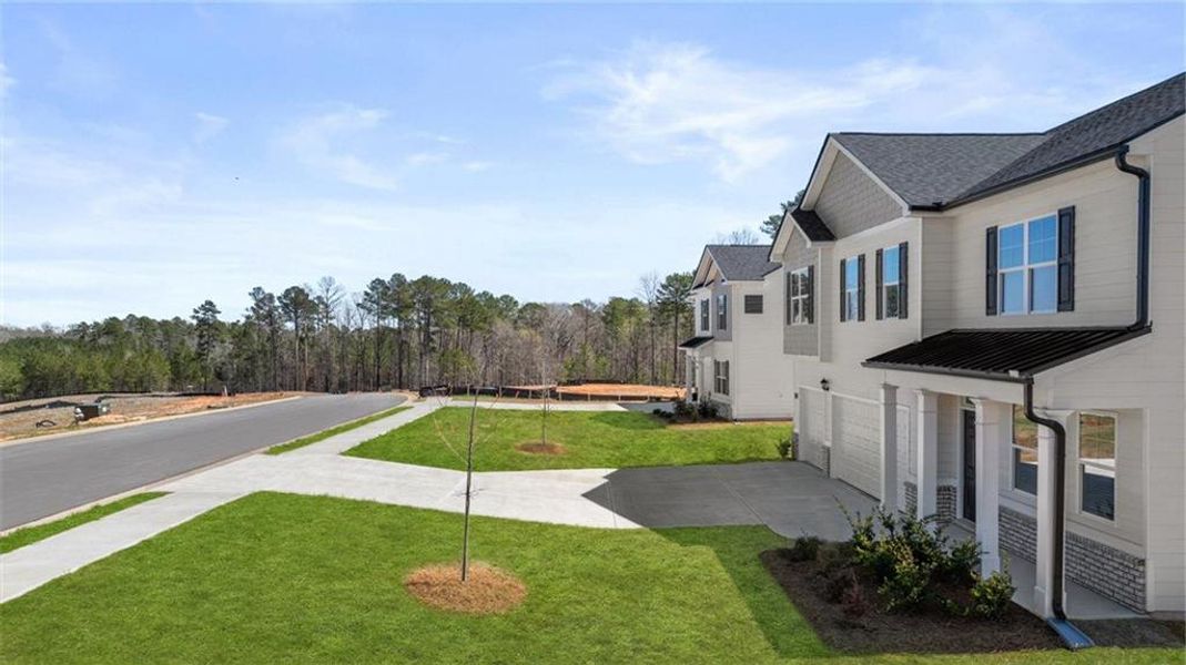 Front exterior of a new home in Kingston Ranch at Lake Oconee, Buckhead, GA, highlighting curb appeal (Image 2).