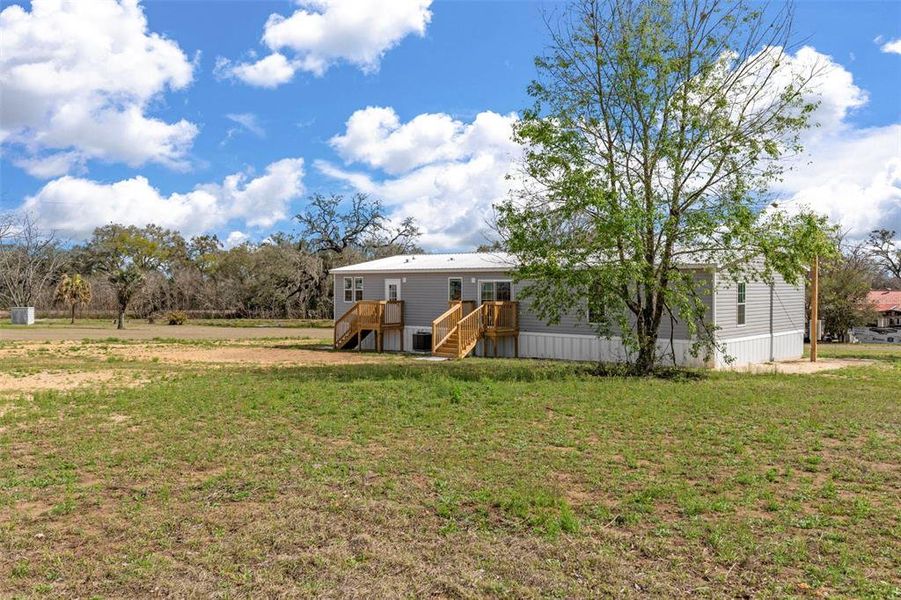 Exterior details and patio area of a home in , Dade City (Image 26).