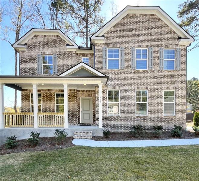 Front exterior of a new home in Broadlands, Atlanta, GA, highlighting curb appeal (Image 1). Front exterior of a new home in Broadlands, Atlanta, GA, highlighting curb appeal (Image 1).