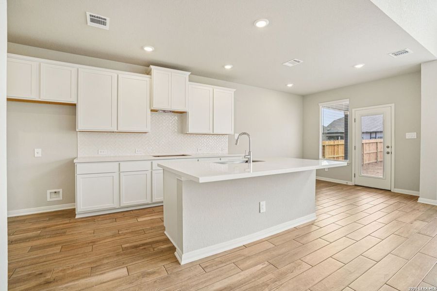Furnished interior view inside a new home in Estancia Ranch - Classic Series, San Antonio (Image 7).