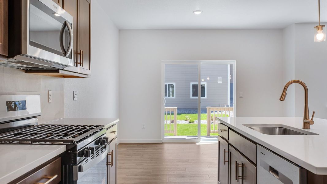 Furnished interior view inside a new home in Trails at Crowfoot, Parker (Image 9).