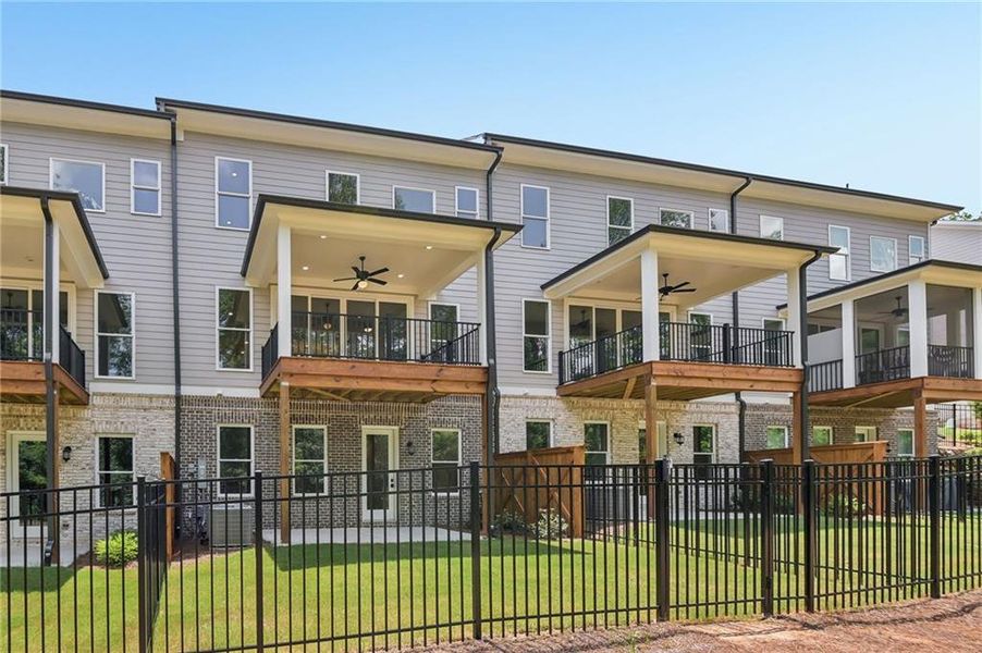 Exterior details and patio area of a home in Waterside Townhomes, Peachtree Corners (Image 20).