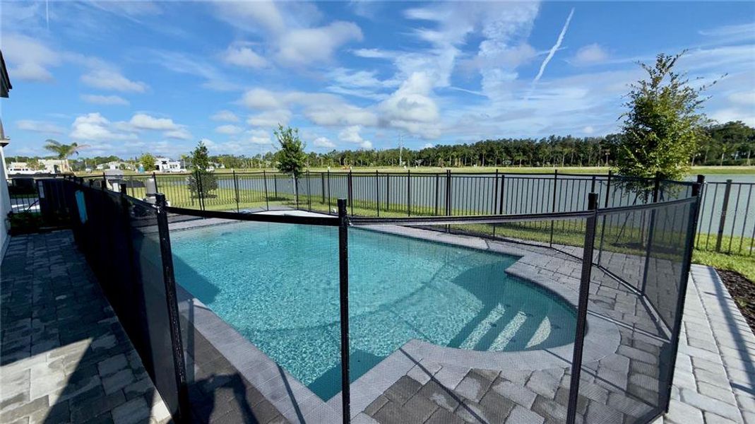 Front exterior of a new home in Valencia Ridge, Wesley Chapel, FL, highlighting curb appeal (Image 24).