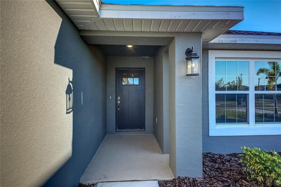 Exterior details and patio area of a home in Aviary at Rutland Ranch, Parrish (Image 24).