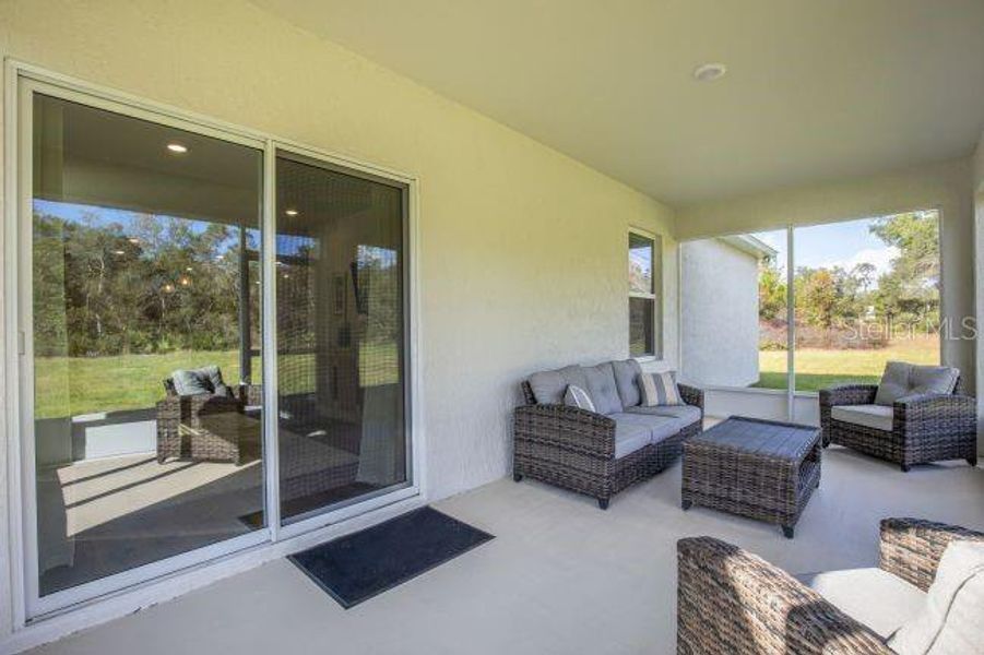 Exterior details and patio area of a home in Royal Highlands, Weeki Wachee (Image 3).
