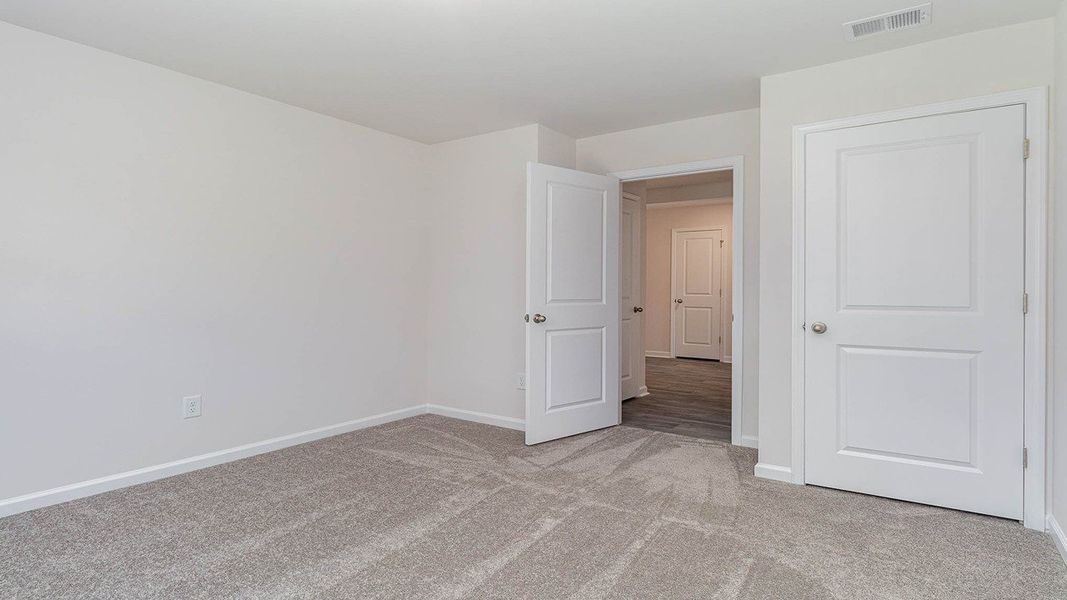 Representative unfurnished interior of a home built from the CALI by D.R. Horton in Heritage Crossing, Conway (Image 21).
