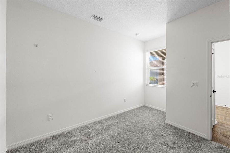 Spacious, unfurnished interior of a new home in Heron Bay, Palmetto (Image 25). Spacious, unfurnished interior of a new home in Heron Bay, Palmetto (Image 25).