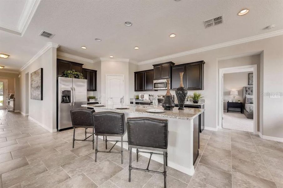 Furnished interior view inside a new home in Kindred, Kissimmee (Image 9).
