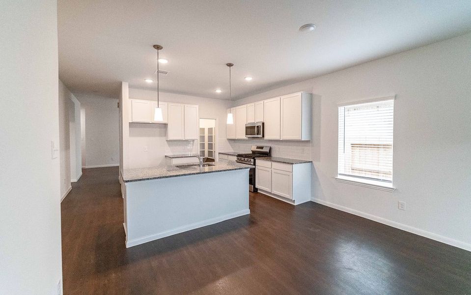 Furnished interior view inside a new home in Windrose Green, Angleton (Image 2).