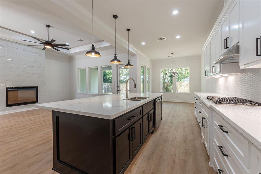 The open concept this kitchen/family room offers makes it perfect when cooking and entertaining.