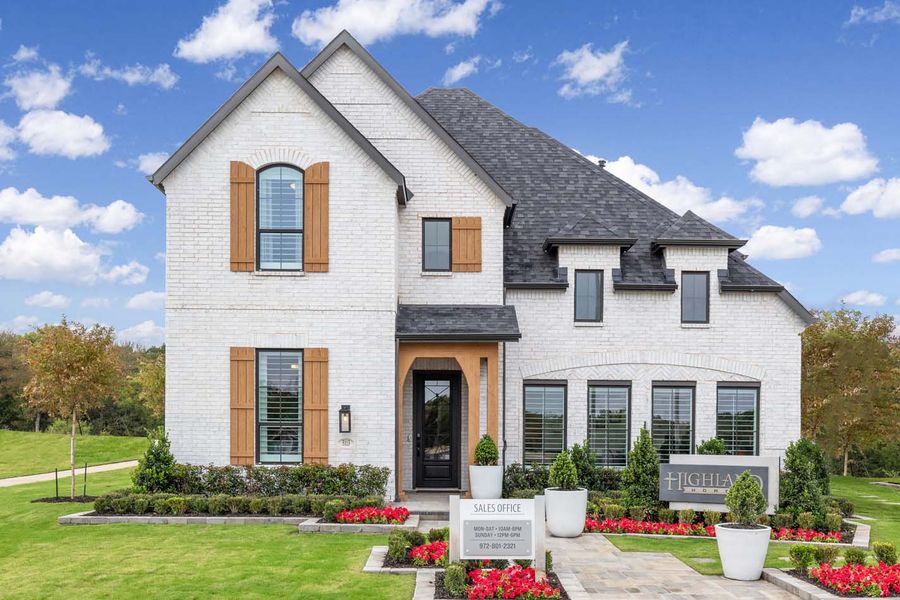 Front exterior of a new home in Gateway Village - The Reserve, Denison, TX, highlighting curb appeal (Image 1). Front exterior of a new home in Gateway Village - The Reserve, Denison, TX, highlighting curb appeal (Image 1).