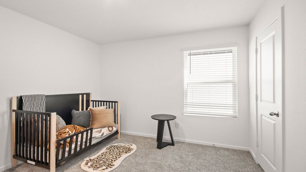 Representative furnished interior of a home built from the 1293 by D.R. Horton in Bridges on Lake Houston Villas, Humble (Image 13).