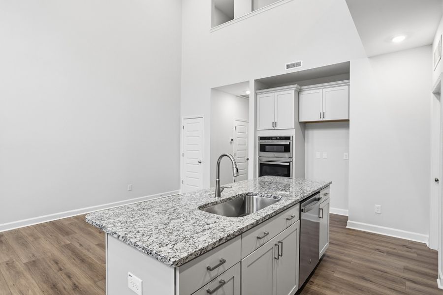 Furnished interior view inside a new home in Ovation at Sweetbrier, Durham (Image 12).