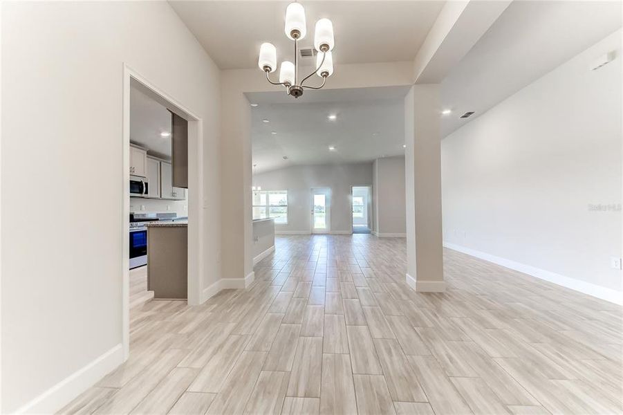 Spacious, unfurnished interior of a new home in Aviary at Rutland Ranch, Parrish (Image 25).