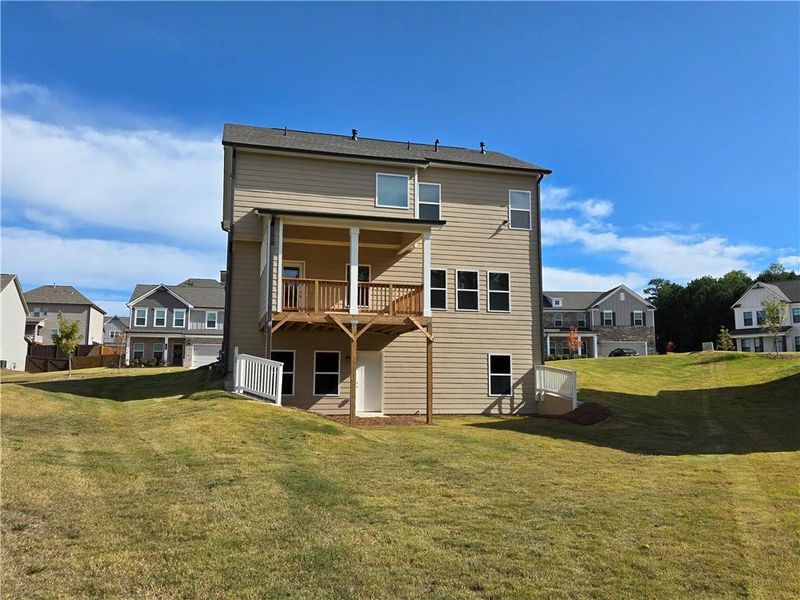 Exterior details and patio area of a home in Enclave at Logan Point, Loganville (Image 21).