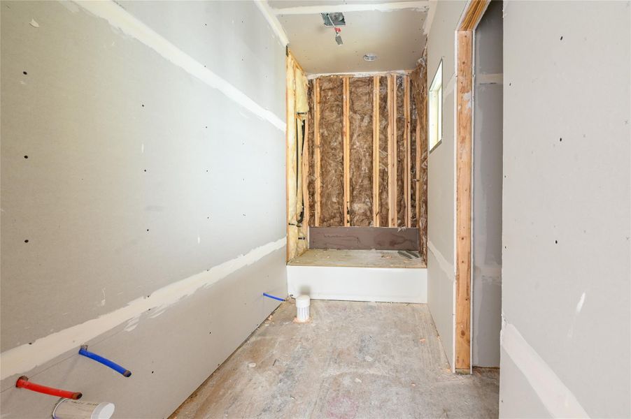 First floor secondary bathroom with walk-in closet