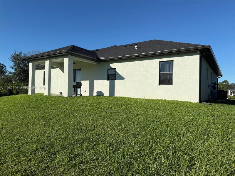 Exterior details and patio area of a home in , Lehigh Acres (Image 3).