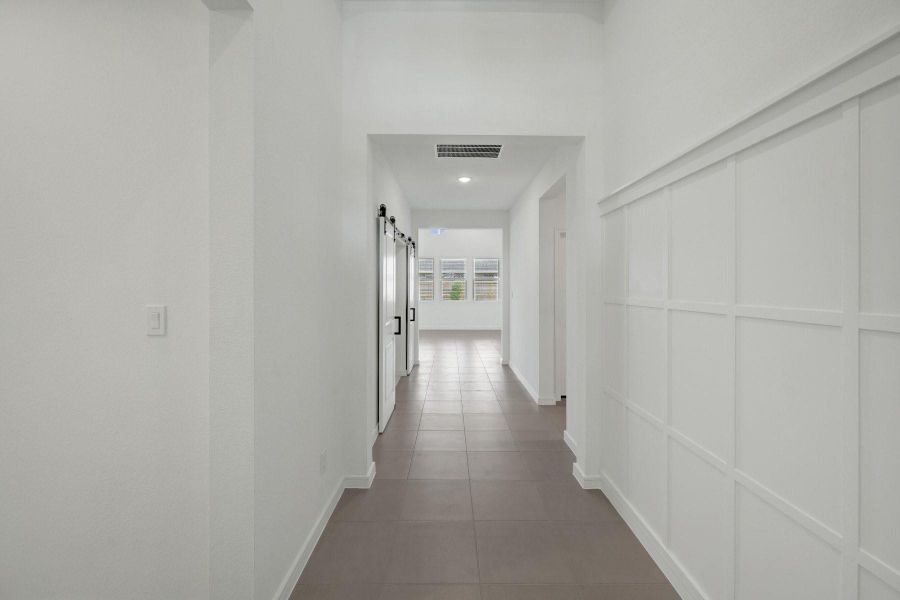 Inviting foyer with decorative feature wall Inviting foyer with decorative feature wall