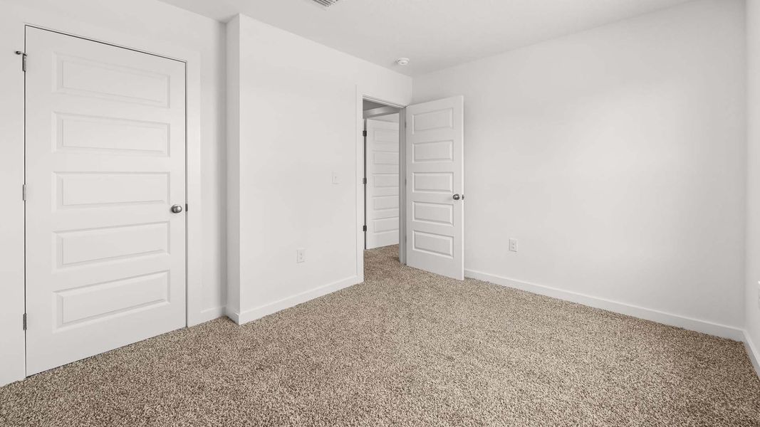 Spacious, unfurnished interior of a new home in Magnolia at the Bluffs Phase 3, Freeport (Image 17).