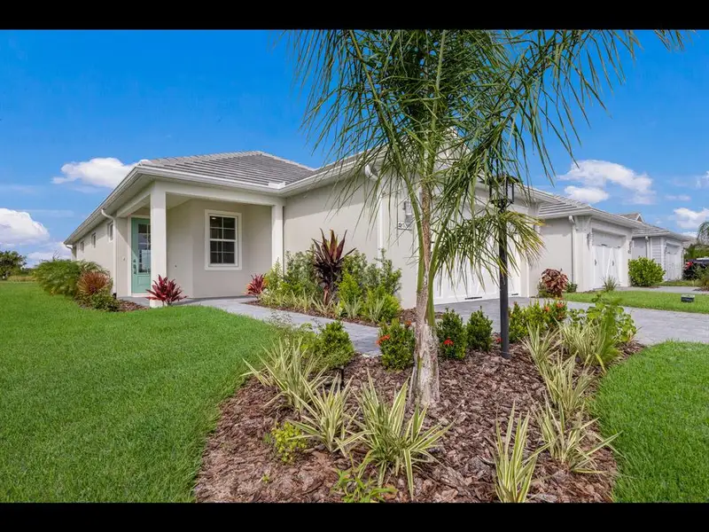 Exterior details and patio area of a home in , Sarasota (Image 23).