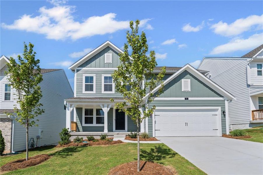 Front exterior of a new home in Twin Lakes, Braselton, GA, highlighting curb appeal (Image 23).
