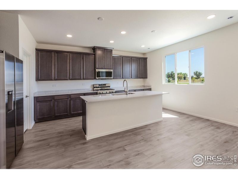 KITCHEN W/ S.S. APPLIANCES