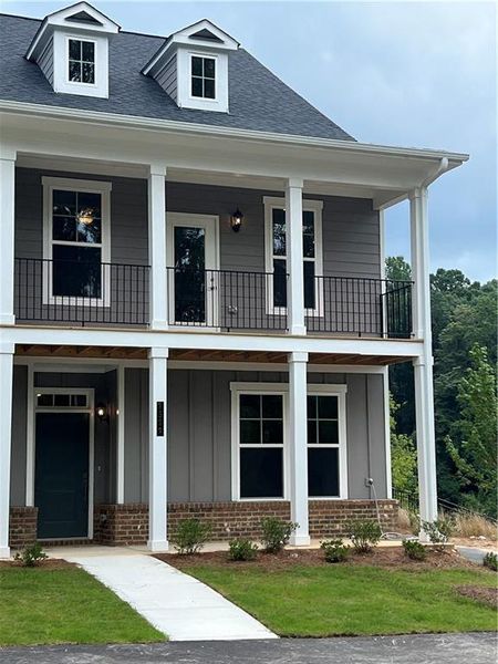 Front exterior of a new home in , Gainesville, GA, highlighting curb appeal (Image 23).
