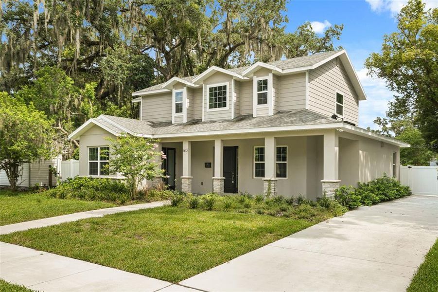 Front exterior of a new home in , Orlando, FL, highlighting curb appeal (Image 2). Front exterior of a new home in , Orlando, FL, highlighting curb appeal (Image 2).