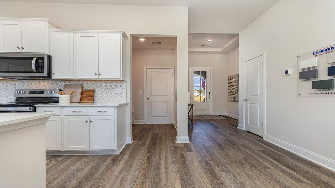 Representative furnished interior of a home built from the Eaton by D.R. Horton in Heron Pointe, Myrtle Beach (Image 7).