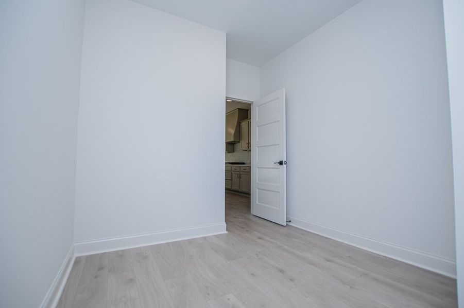 Spacious, unfurnished interior of a new home in The Reserve at Red Oaks, Carrollton (Image 19).