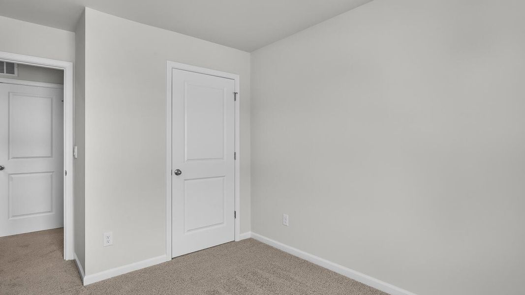 Spacious, unfurnished interior of a new home in Townes at Seabrooke, Leland (Image 26).