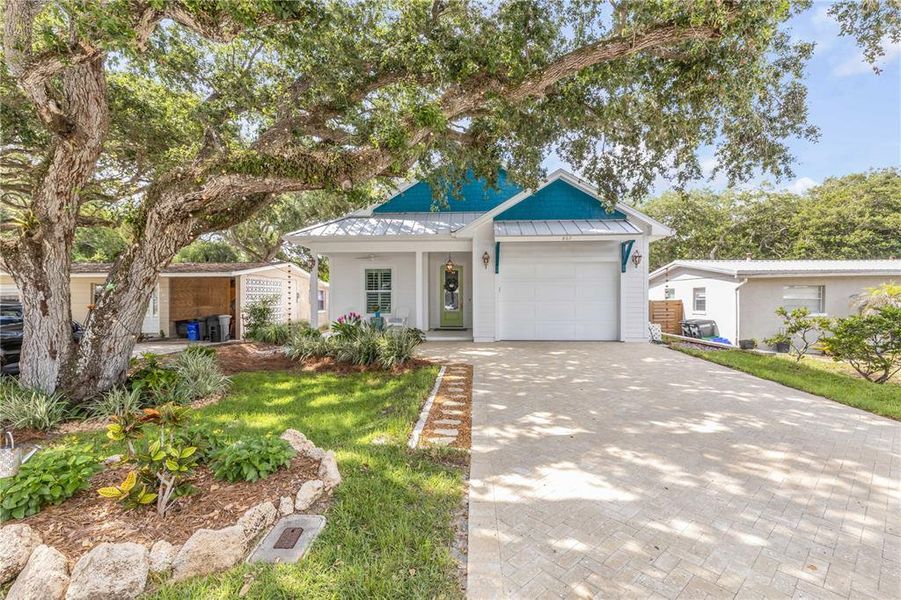 Front exterior of a new home in , New Smyrna Beach, FL, highlighting curb appeal (Image 1). Front exterior of a new home in , New Smyrna Beach, FL, highlighting curb appeal (Image 1).