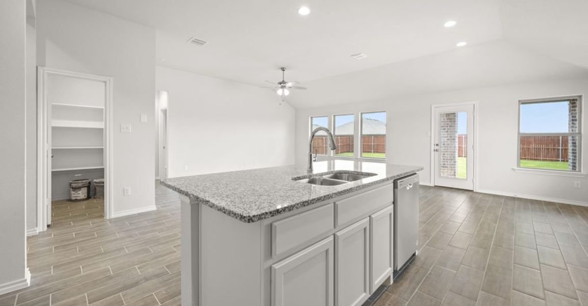 Representative exterior photo of a completed home built from the Atlanta by Impression Homes in Baker Farms, Cleburne, TX (Image 8). Representative exterior photo of a completed home built from the Atlanta by Impression Homes in Baker Farms, Cleburne, TX (Image 8).