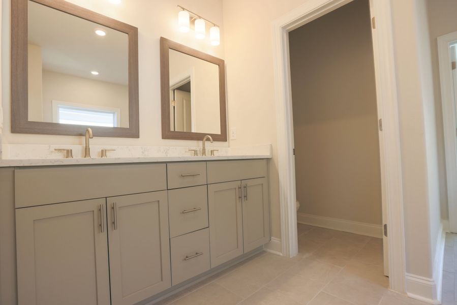 Representative furnished interior of a home built from the The Bennett by The Providence Group in Aberdeen, Hoschton (Image 17).