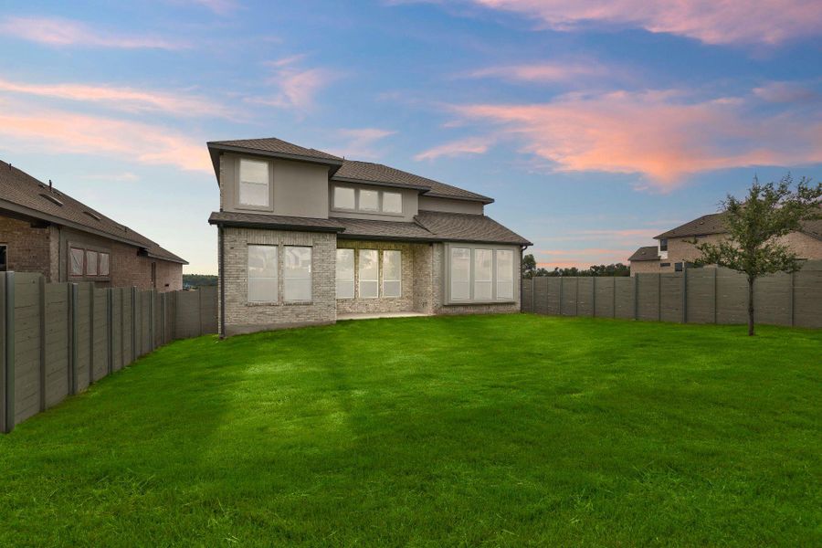 Rear of Home and Private Backyard