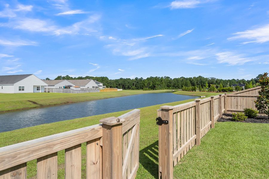 Exterior details and patio area of a home in Hewing Farms, Summerville (Image 26).